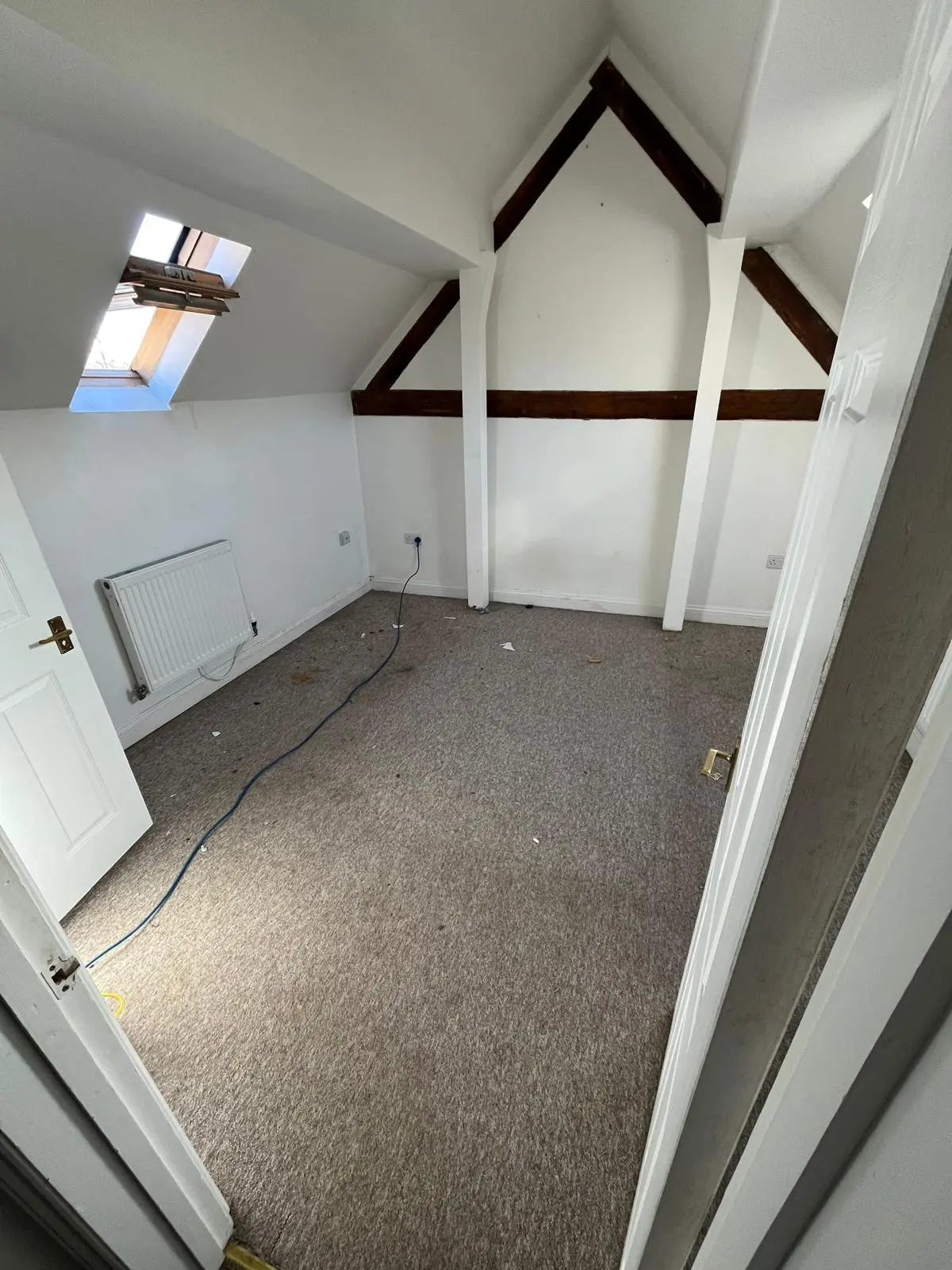 Stained bedroom carpet before professional deep cleaning